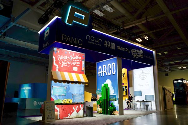 The Panic PAX West booth in 2023, showing Thank Goodness You're Here!, Arco, and Time Flies