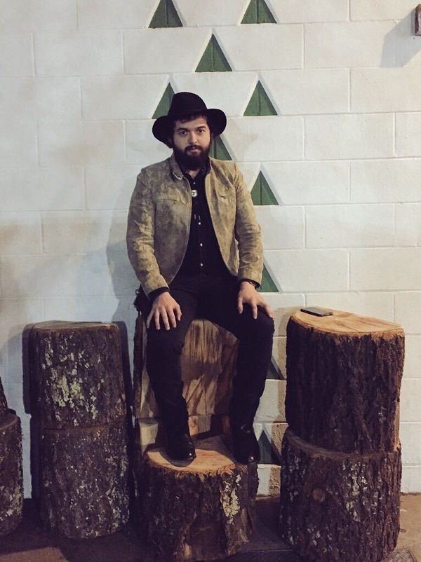 A mysterious hipster who appeared to sit on the stumps